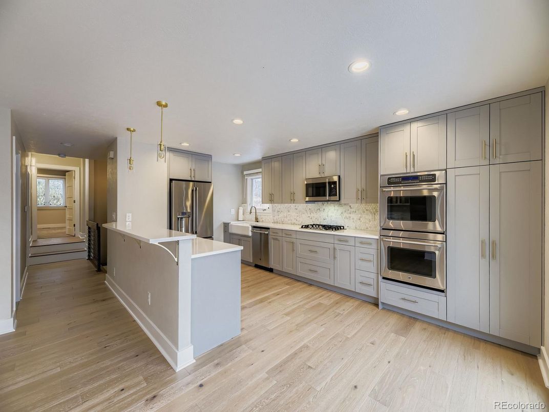 Interior, Kitchen, Pendant Lights, Recessed Lighting, Stainless Steel Appliances, Wood Texture Flooring
