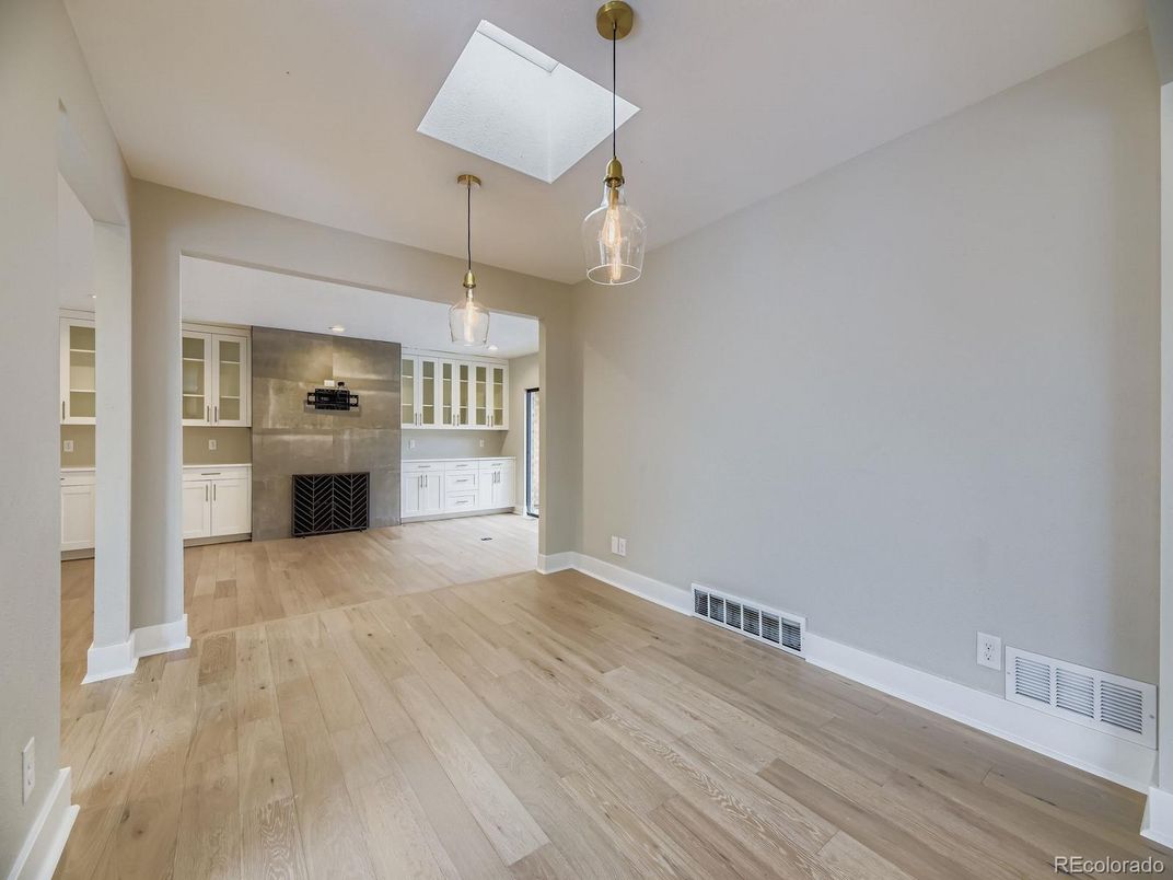 Empty room, Interior, Pendant Lights, Stainless Steel Appliances, Wood Texture Flooring