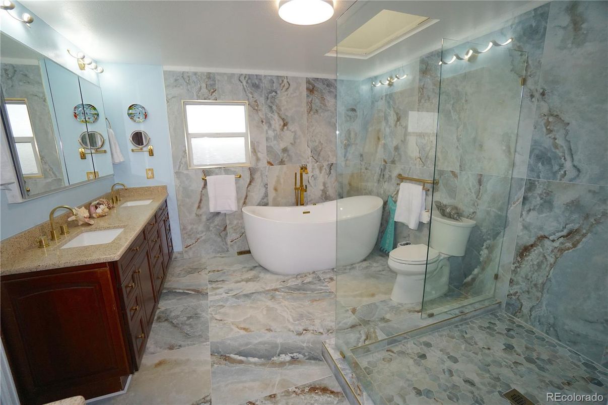 Bathroom, Dual Sink Vanities, Free Standing Baths, Glass Shower, Interior, Marble Walls