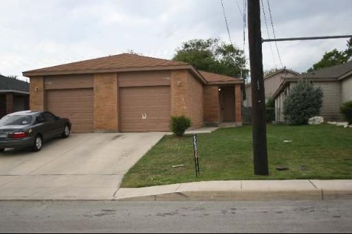 Attached, Exterior, Facade, Brick Facade, None