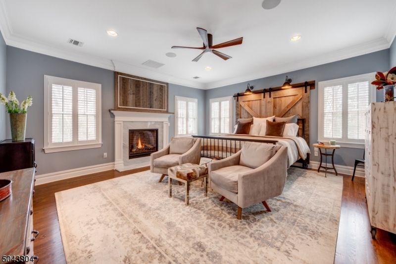 Bedroom, Fireplace, Interior, Recessed Lighting, Wood Texture Flooring