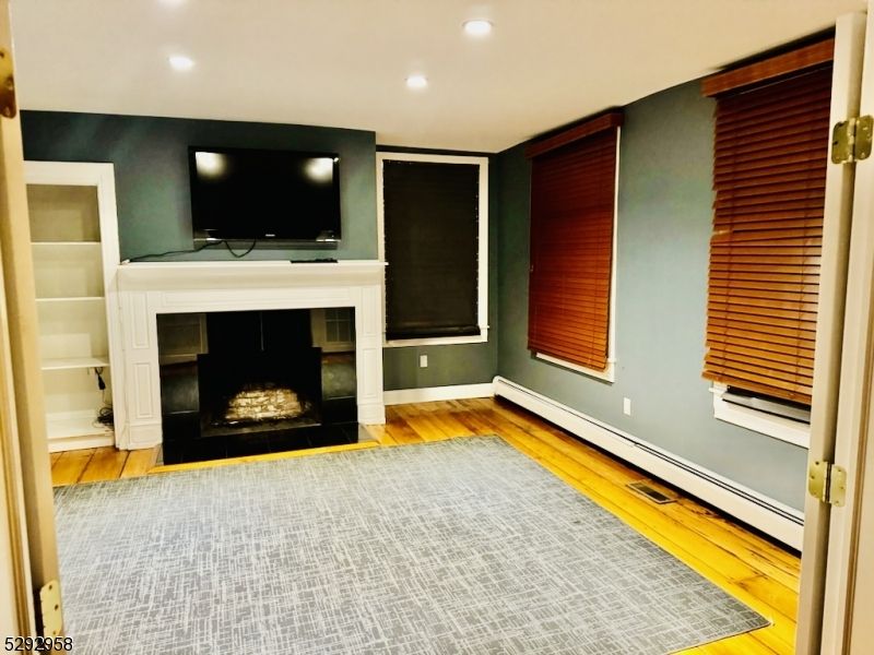 Fireplace, Interior, Recessed Lighting, Wood Texture Flooring