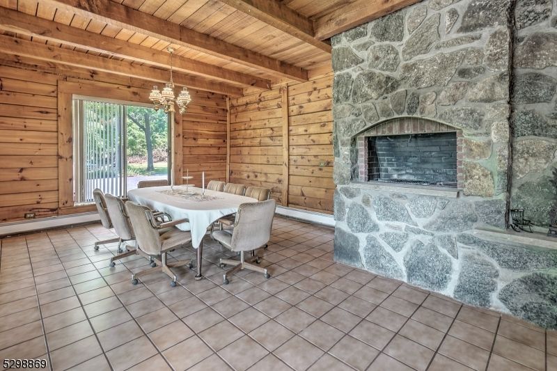 Chandelier, Dining room, Fireplace, Interior, Stone Walls, Wooden Beams, Wooden Ceilings, Wooden Walls