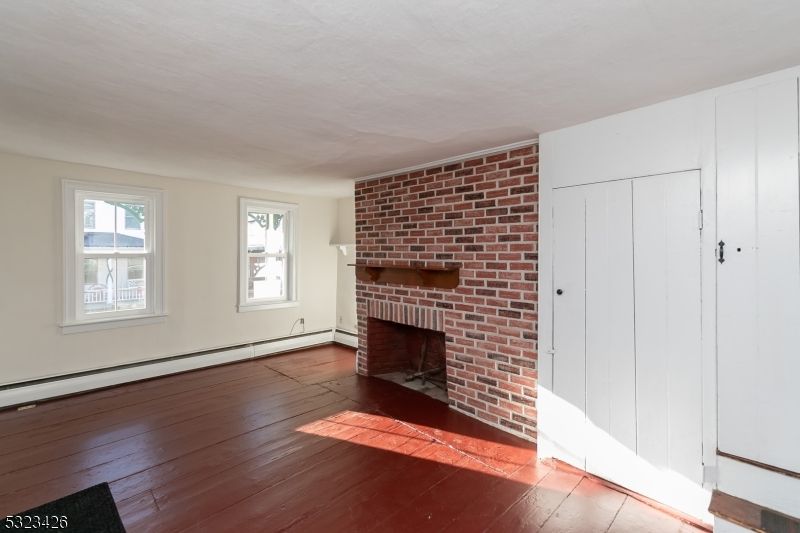 Empty room, Fireplace, Interior, Stone Walls, Wood Texture Flooring