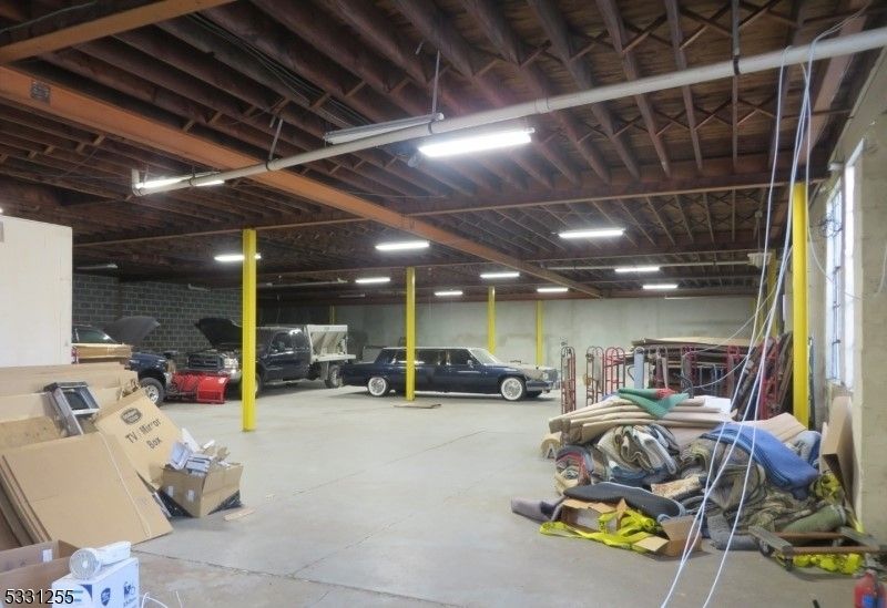 Garage, Interior, Recessed Lighting, Stone Walls, Wooden Beams