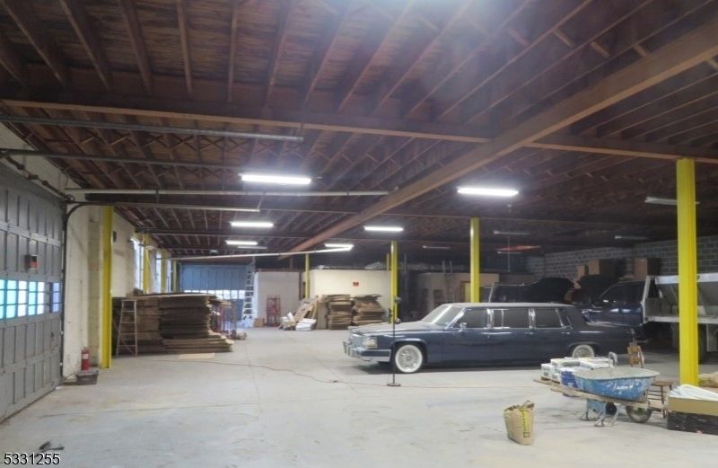 Garage, Interior, Stone Walls, Wooden Beams