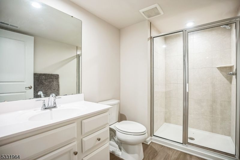 Bathroom, Glass Shower, Interior, Recessed Lighting, Wood Texture Flooring
