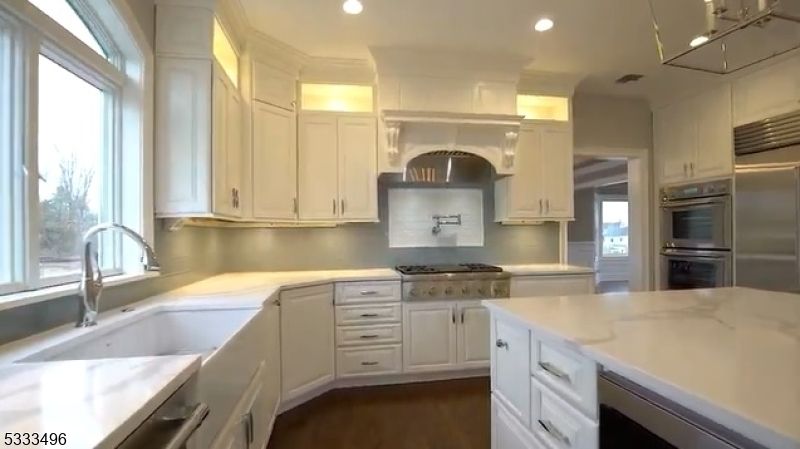 Chandelier, Interior, Kitchen, Recessed Lighting, Stainless Steel Appliances, Wood Texture Flooring