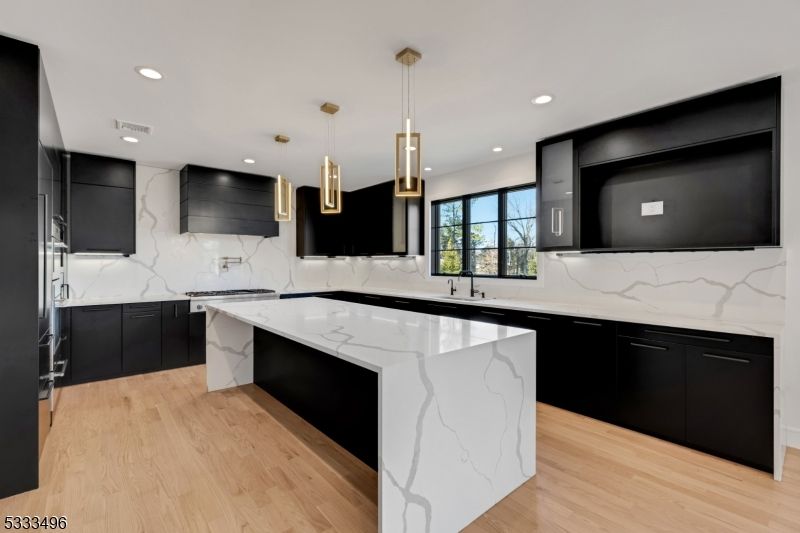 Interior, Kitchen, Marble Walls, Pendant Lights, Recessed Lighting, Wood Texture Flooring