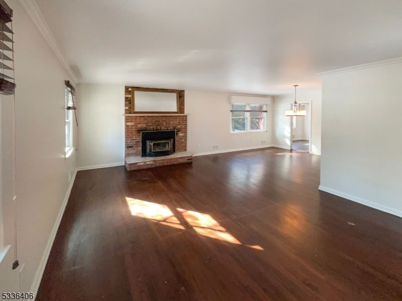 Empty room, Fireplace, Interior, Pendant Lights, Wood Texture Flooring