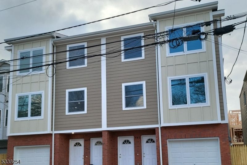 Attached, Exterior, Facade, Brick Facade, Rowhouse