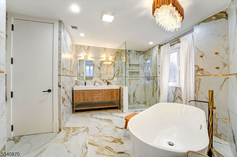 Bathroom, Chandelier, Free Standing Baths, Glass Shower, Interior, Marble, Marble Walls, Recessed Lighting