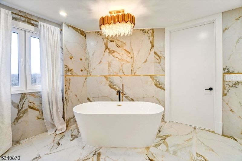 Bathroom, Chandelier, Free Standing Baths, Interior, Marble, Marble Walls, Recessed Lighting