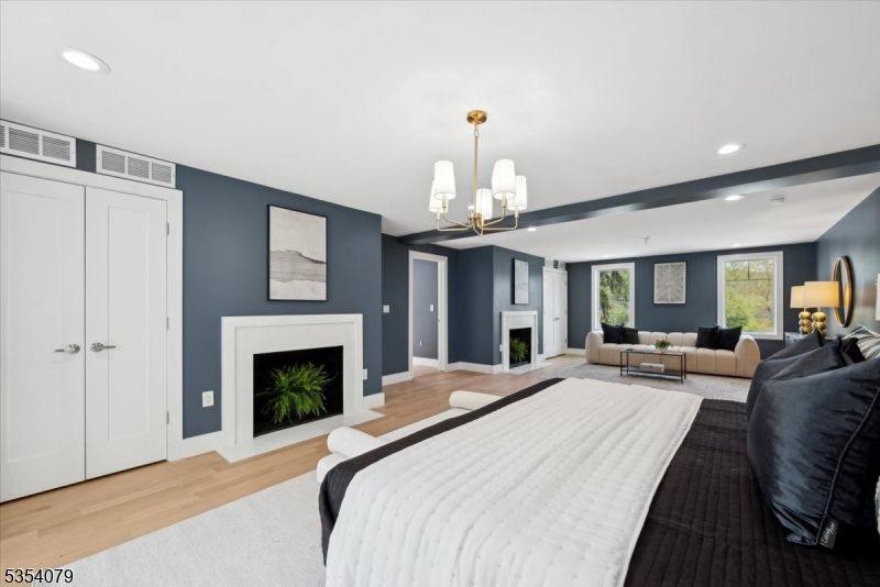 Bedroom, Fireplace, Interior, Pendant Lights, Recessed Lighting, Wood Texture Flooring