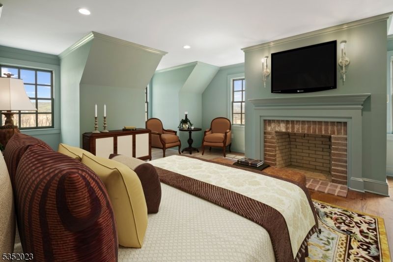 Bedroom, Fireplace, Interior, Recessed Lighting, Wood Texture Flooring