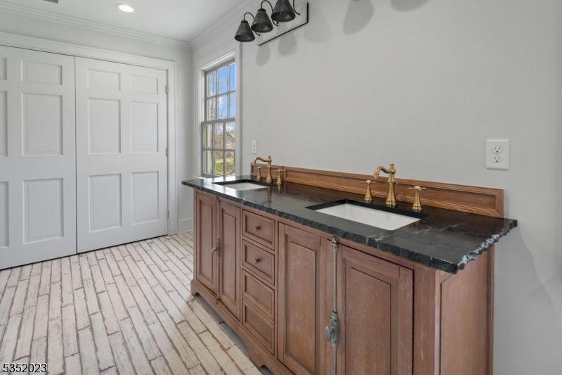 Bathroom, Dual Sink Vanities, Interior, Recessed Lighting, Wood Texture Flooring