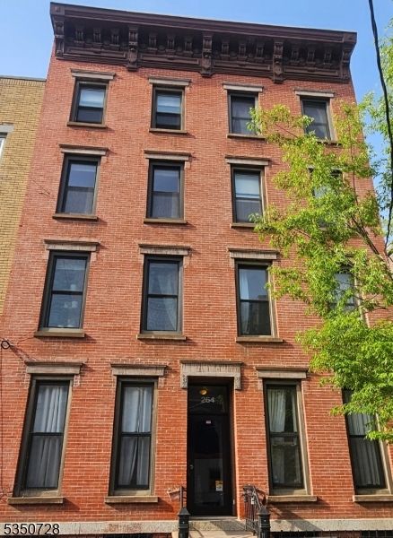 Exterior, Facade, Brick Facade, Rowhouse