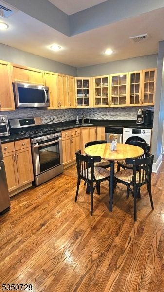 Dining room, Interior, Kitchen, Recessed Lighting, Stainless Steel Appliances, Wood Texture Flooring