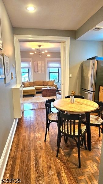 Dining room, Interior, Kitchen, Living room, Recessed Lighting, Stainless Steel Appliances, Wood Texture Flooring