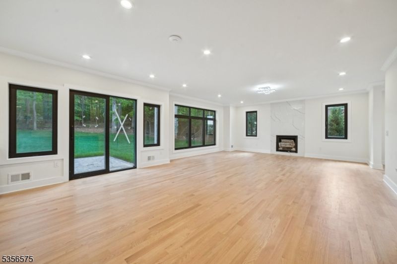 Empty room, Fireplace, Interior, Recessed Lighting, Wood Texture Flooring