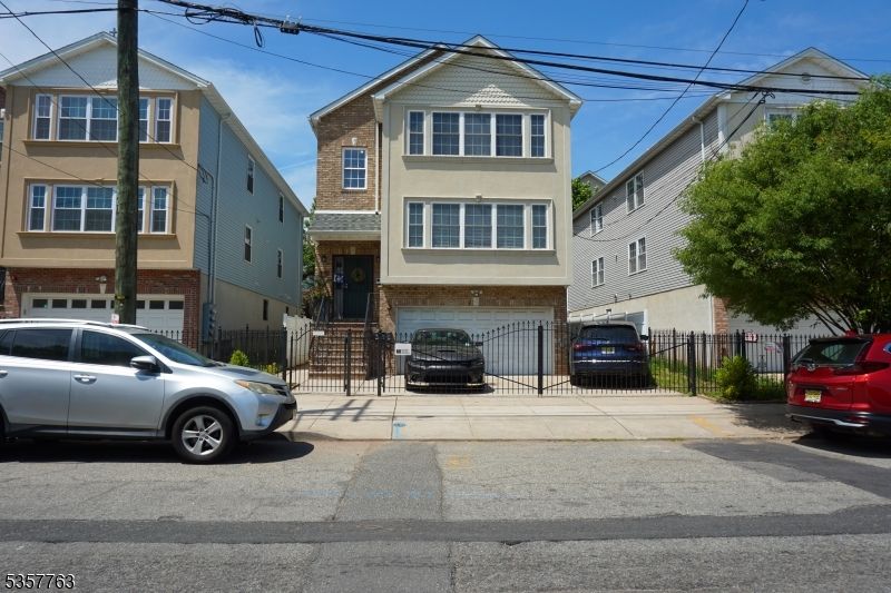 Attached, Exterior, Facade, Brick Facade, Rowhouse