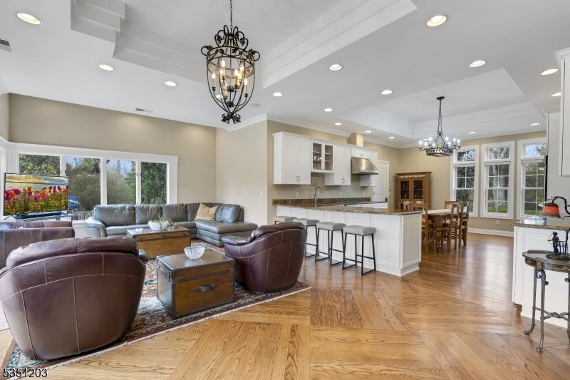 Chandelier, Dining room, Interior, Kitchen, Living room, Pendant Lights, Recessed Lighting, Wood Texture Flooring