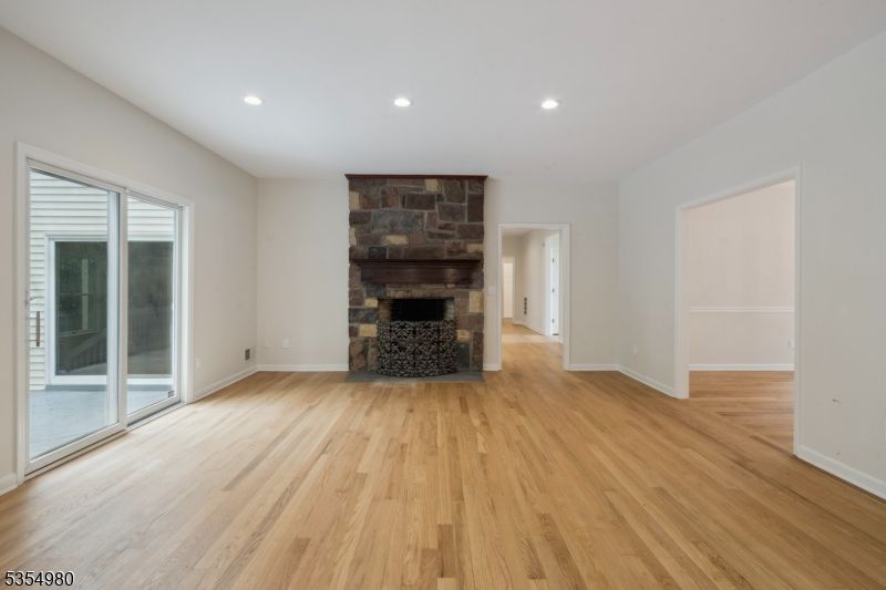 Empty room, Fireplace, Interior, Recessed Lighting, Wood Texture Flooring