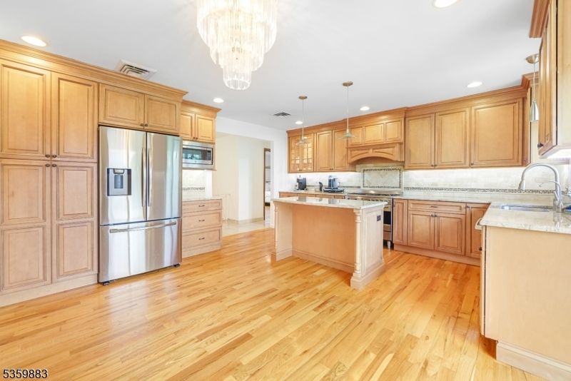 Chandelier, Interior, Kitchen, Pendant Lights, Recessed Lighting, Stainless Steel Appliances, Wood Texture Flooring