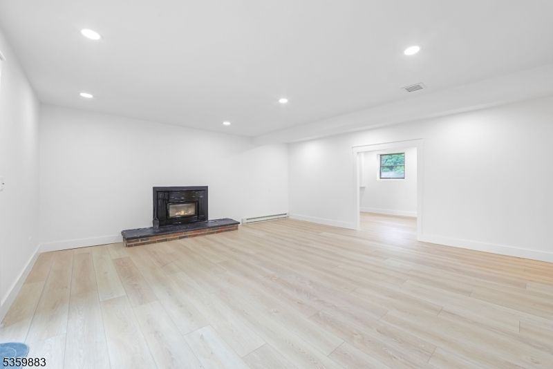 Empty room, Fireplace, Interior, Recessed Lighting, Wood Texture Flooring