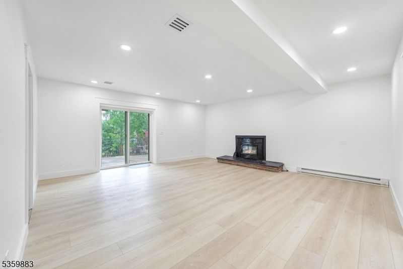 Empty room, Fireplace, Interior, Recessed Lighting, Wood Texture Flooring
