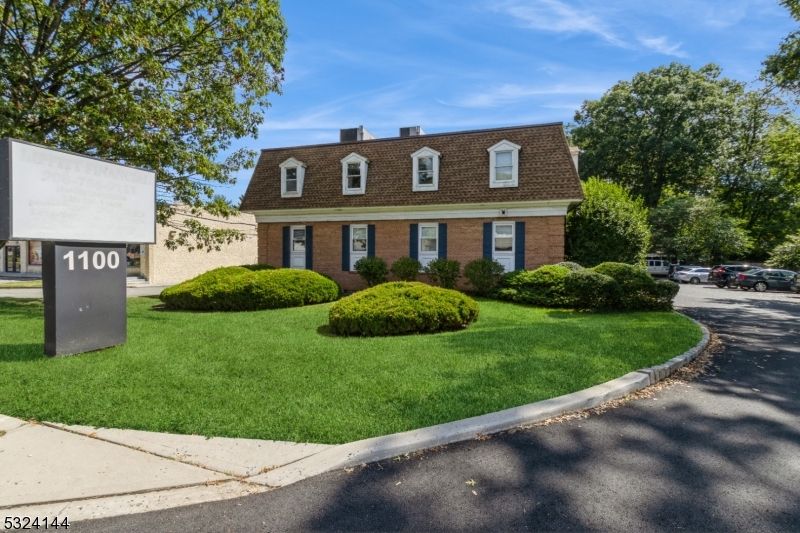 Exterior, Facade, Brick Facade, Cape Cod