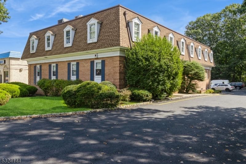 Exterior, Facade, Brick Facade, Cape Cod