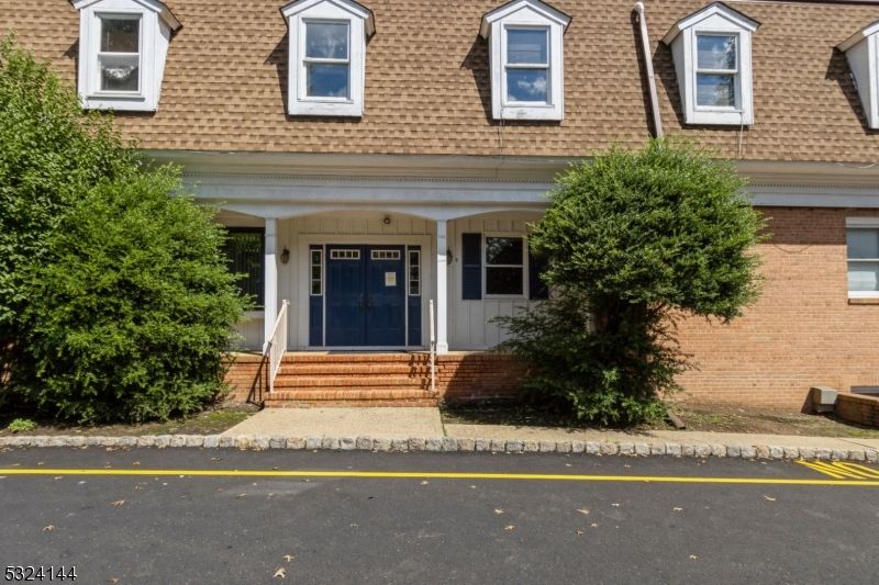 Exterior, Facade, Brick Facade, Cape Cod