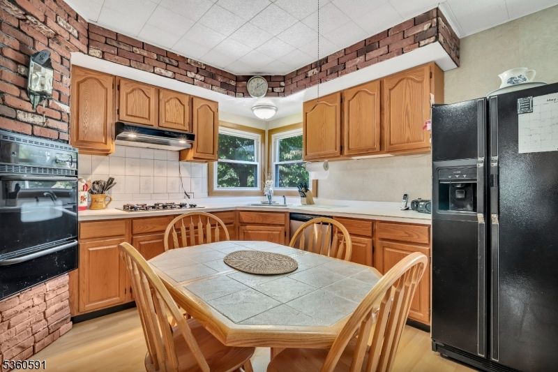 Dining room, Interior, Kitchen, Tile Countertops, Wood Texture Flooring