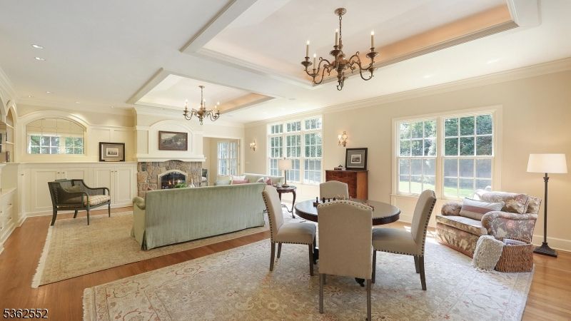 Chandelier, Dining room, Fireplace, Interior, Living room, Recessed Lighting, Wood Texture Flooring