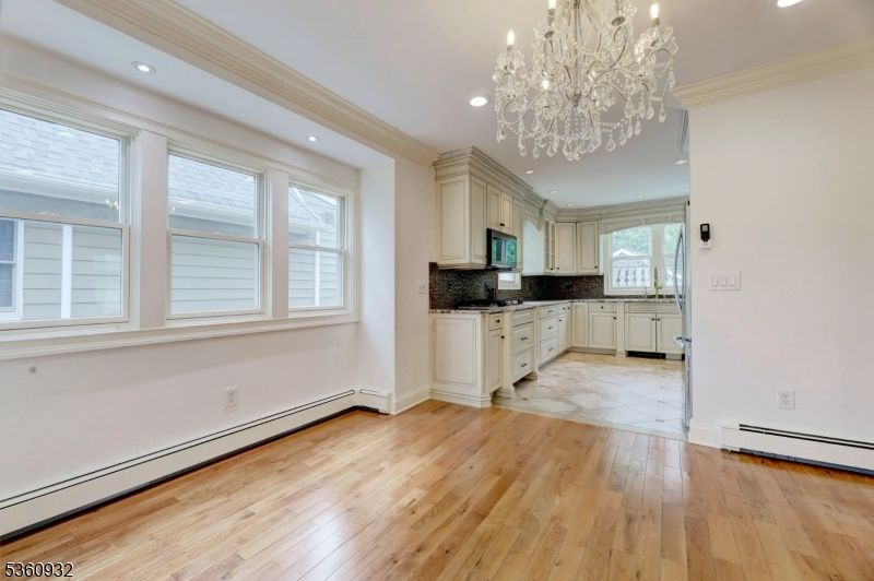 Chandelier, Empty room, Interior, Kitchen, Recessed Lighting, Wood Texture Flooring