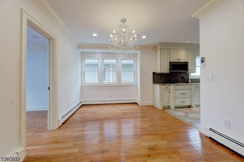 Chandelier, Empty room, Interior, Kitchen, Recessed Lighting, Wood Texture Flooring