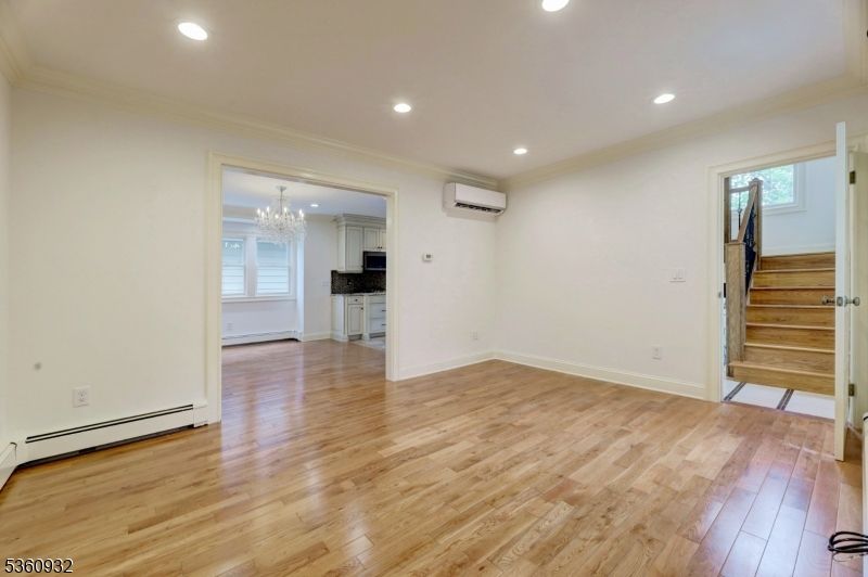 Chandelier, Empty room, Interior, Recessed Lighting, Wood Texture Flooring