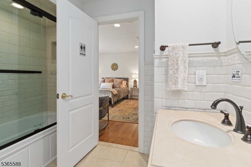 Bathroom, Bedroom, Glass Shower, Interior, Recessed Lighting, Wood Texture Flooring