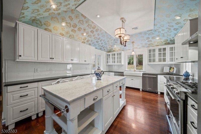 Chandelier, Interior, Kitchen, Pendant Lights, Recessed Lighting, Stainless Steel Appliances, Wood Texture Flooring