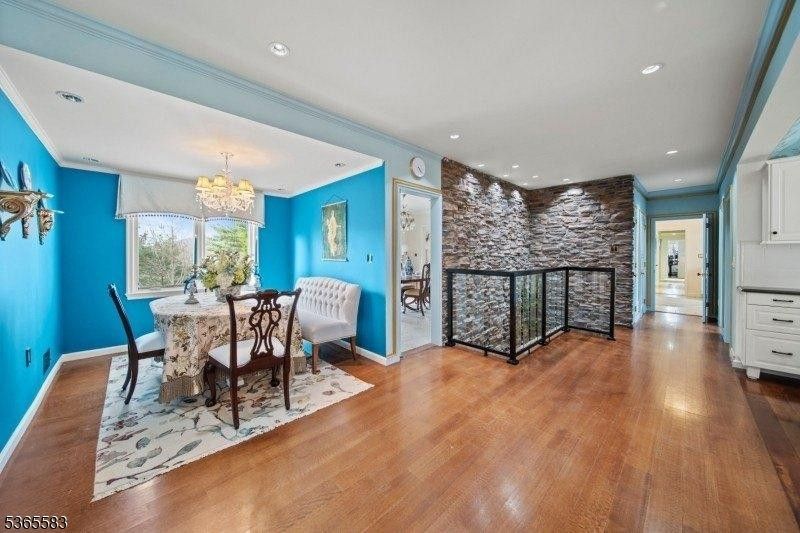Chandelier, Dining room, Interior, Recessed Lighting, Stone Walls, Wood Texture Flooring