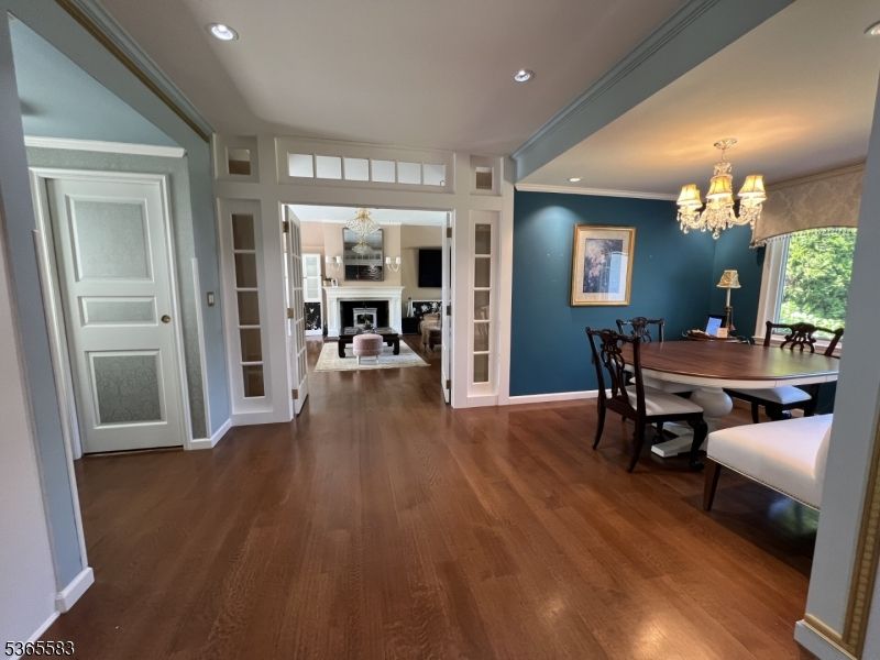 Chandelier, Dining room, Fireplace, Interior, Recessed Lighting, Wood Texture Flooring