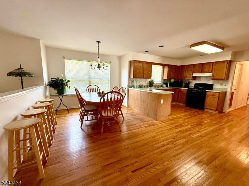 Chandelier, Dining room, Interior, Kitchen, Recessed Lighting, Wood Texture Flooring