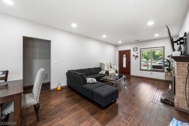 Fireplace, Home Office, Interior, Living room, Recessed Lighting, Wood Texture Flooring