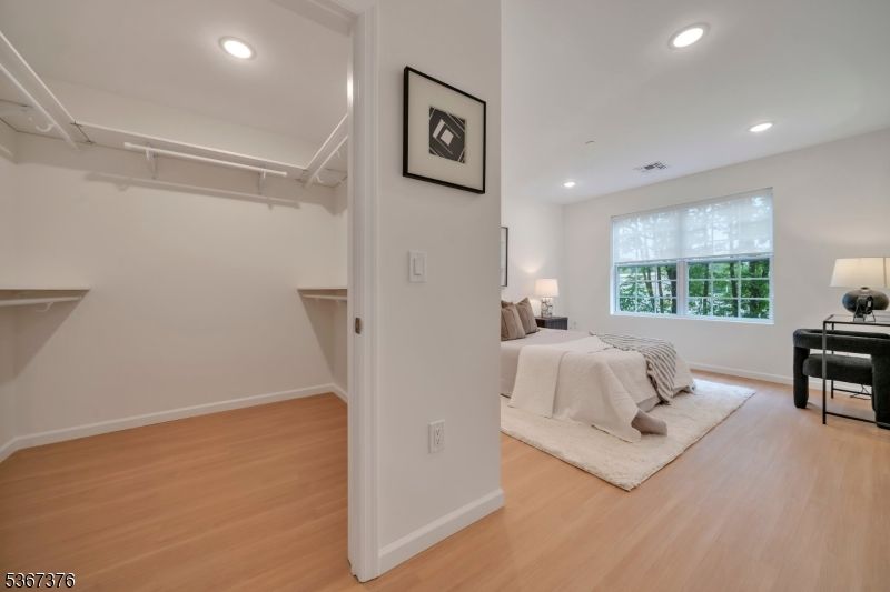 Bedroom, Interior, Recessed Lighting, Walk-in Closets, Wood Texture Flooring
