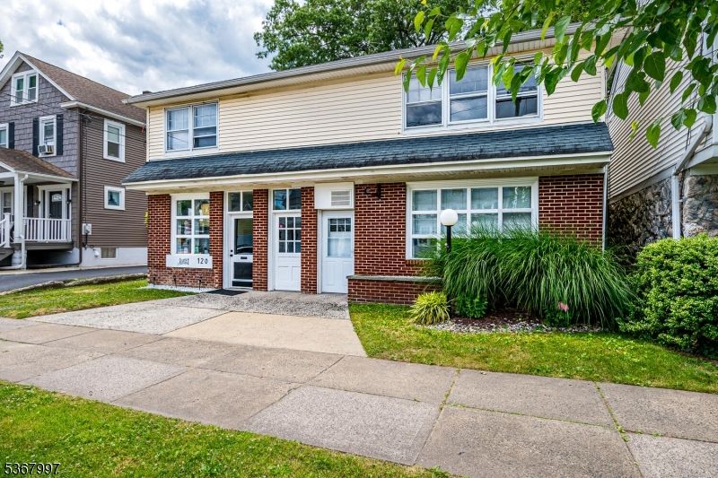 Exterior, Facade, Brick Facade, Cape Cod