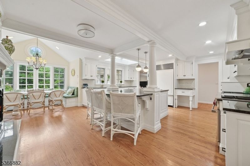 Chandelier, Dining room, Interior, Kitchen, Pendant Lights, Recessed Lighting, Stainless Steel Appliances, Wood Texture Flooring