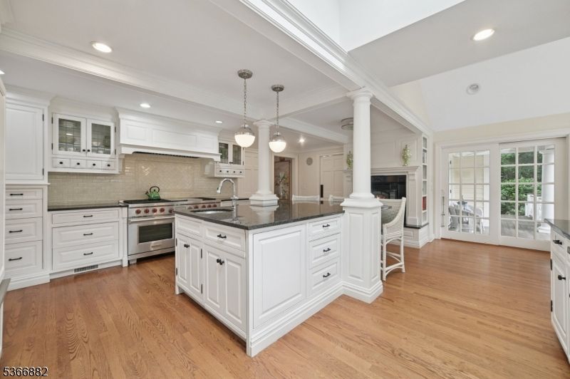 Fireplace, Interior, Kitchen, Pendant Lights, Recessed Lighting, Stainless Steel Appliances, Wood Texture Flooring