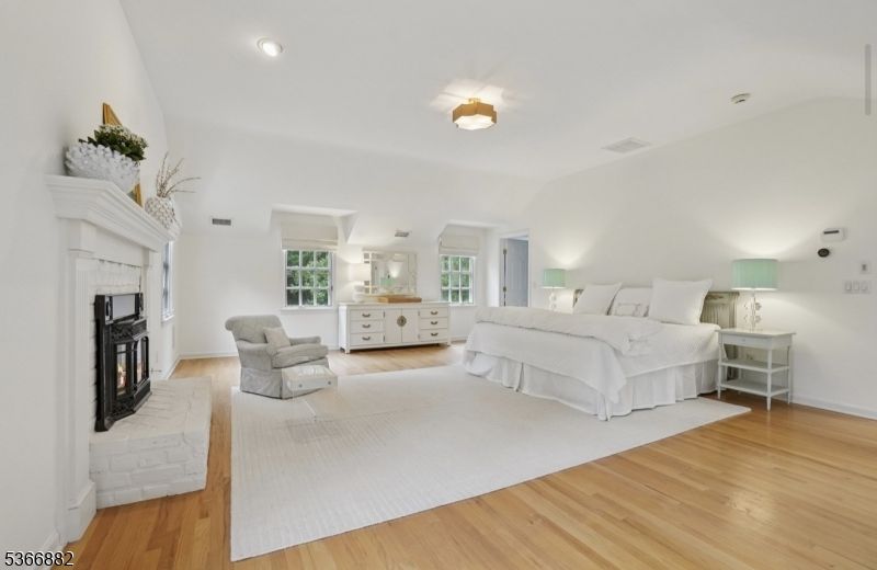 Bedroom, Fireplace, Interior, Recessed Lighting, Wood Texture Flooring