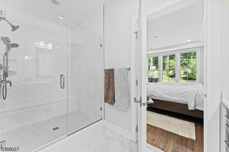 Bathroom, Bedroom, Glass Shower, Interior, Marble, Marble Walls, Recessed Lighting, Wood Texture Flooring